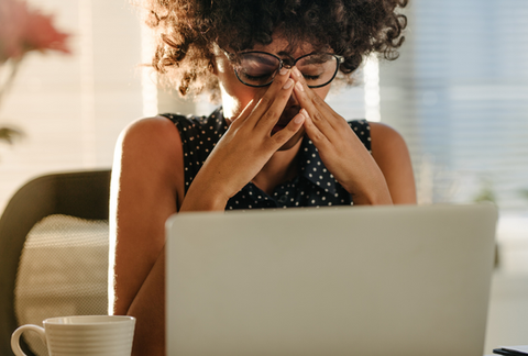 woman stressed in front of computer acupuncture santa monica