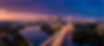 Colorful sunset over the Austin skyline as IH-35 traffic flows through downtown.jpg