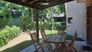 Exterior. Sector parrilla y jardin 