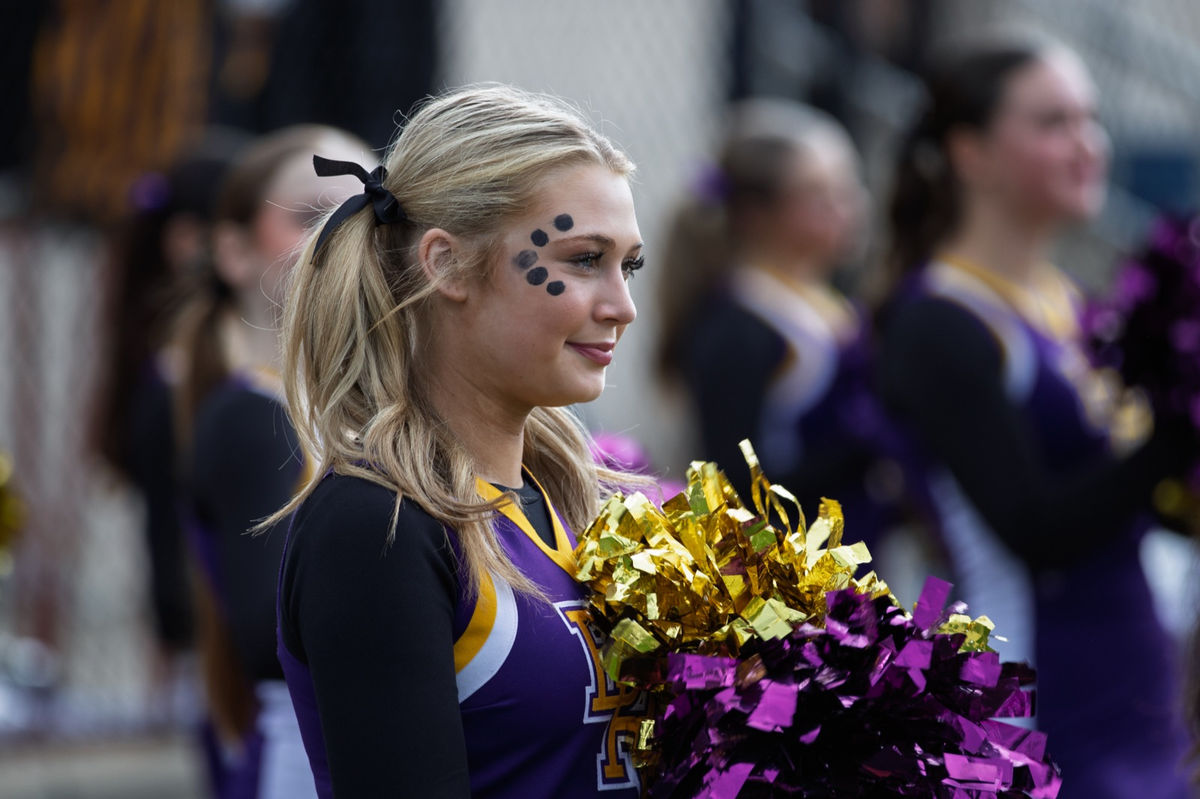 Boulder High cheer and poms students supporting the Panthers