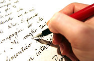 Hand writing letter with red fountain pen