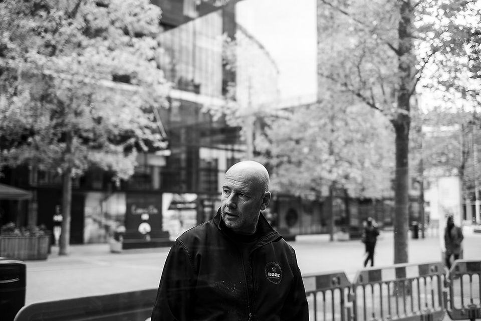 Paul Smith, Rock maintenance portrait, in the door frame he has just fitted.