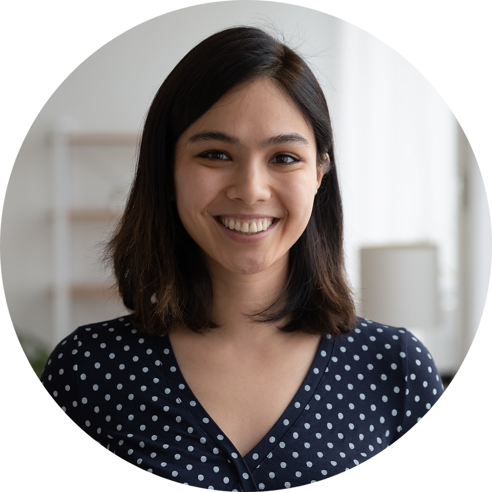 Smiling woman in polka dot shirt looking directly at the camera About Charleston Brain Lab.