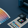 Color chart, magnifying glass, and printer: precise color quality control