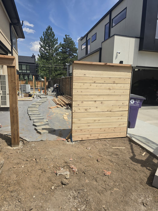 Horizontal wood privacy fence project in backyard gallery