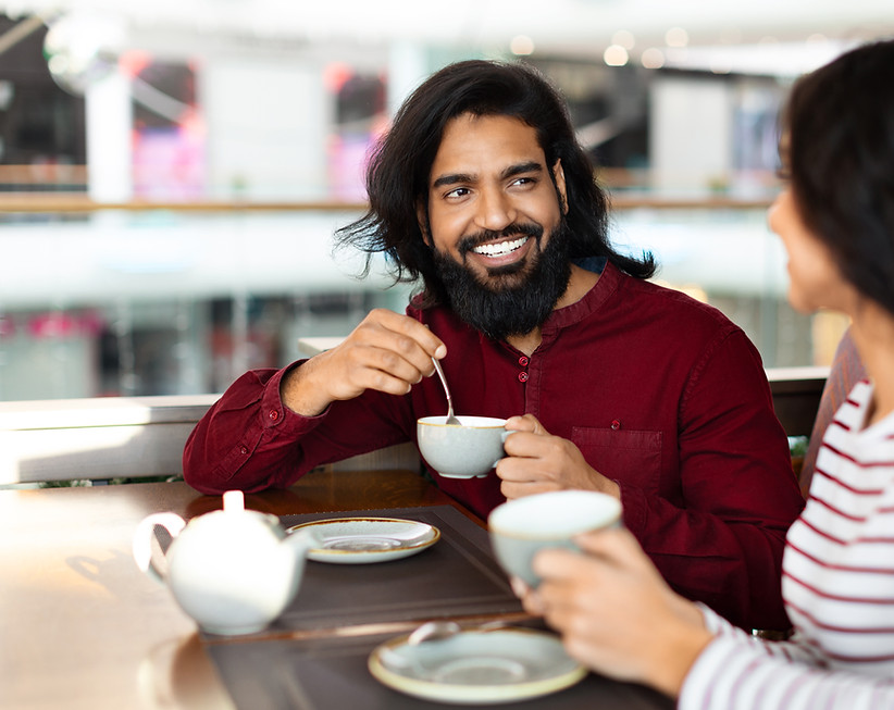 cheerful-young-indian-man-enjoying-date-with-his-g-2025-03-18-17-22-53-utc.jpg