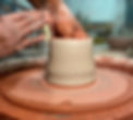 Place your hand on the inside of the cylinder and spin the wheel slowly. Using your hands