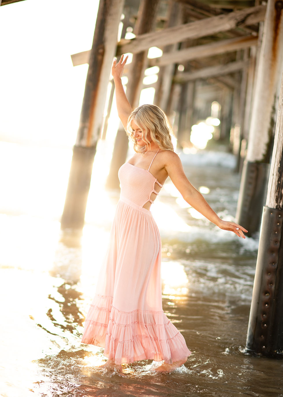 High school senior posing outdoors during a classic senior portrait session