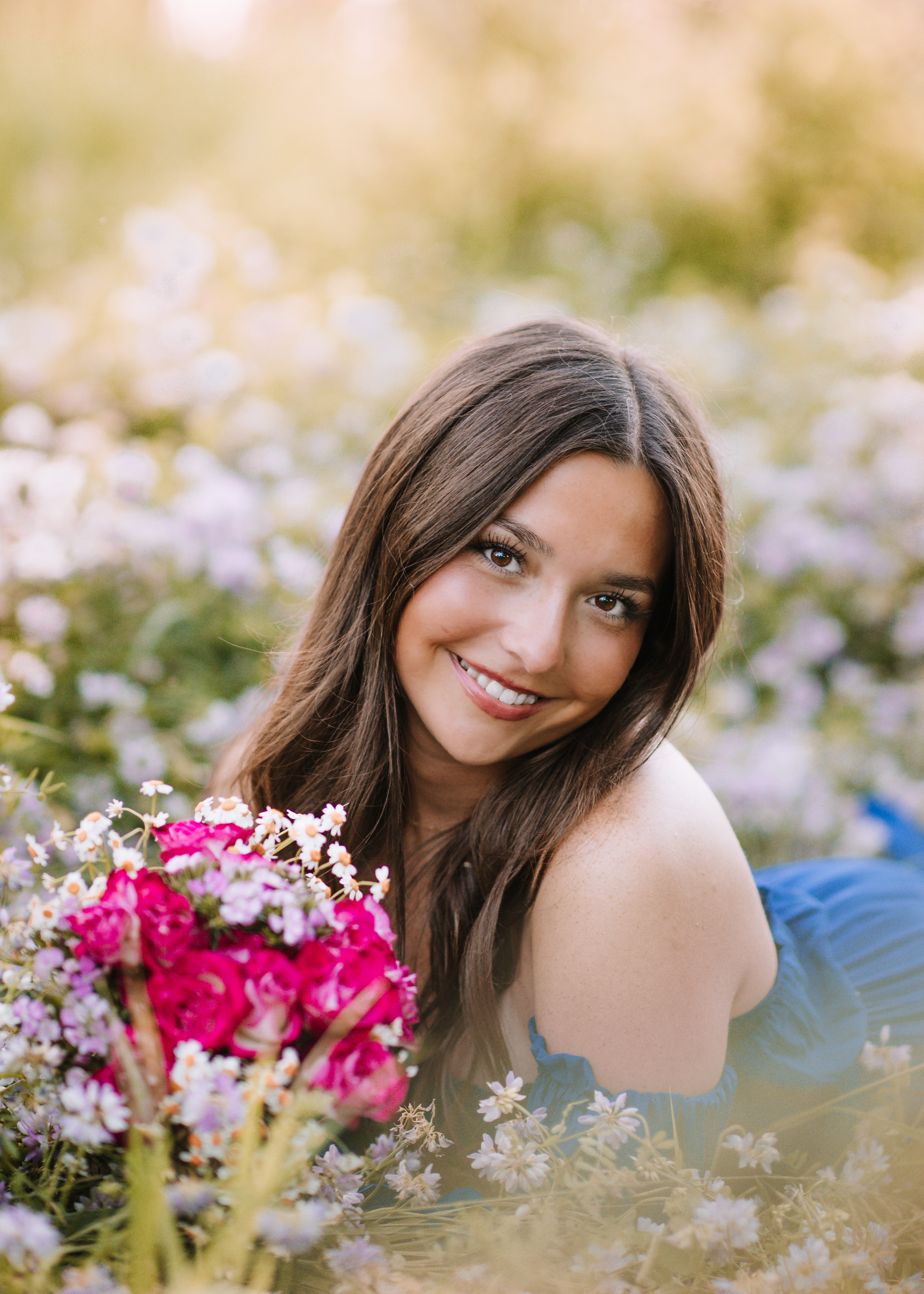 High school senior moving naturally during an outdoor portrait session