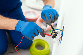 professional-electrician-testing-an-outlet-2026-01-06-10-42-08-utc.jpg