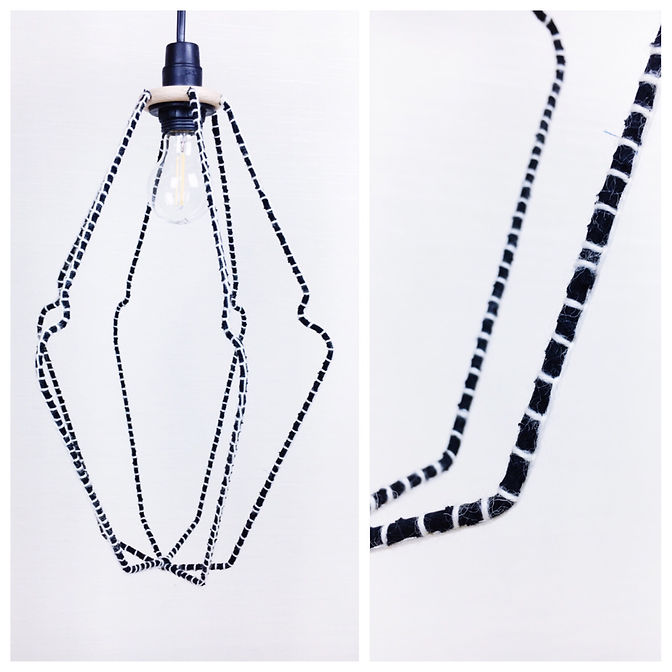 résilientes emmaus upcycling design insertion création récupération slowdesign social refabrication cintrés lampes cintres noir blanc détail laine 