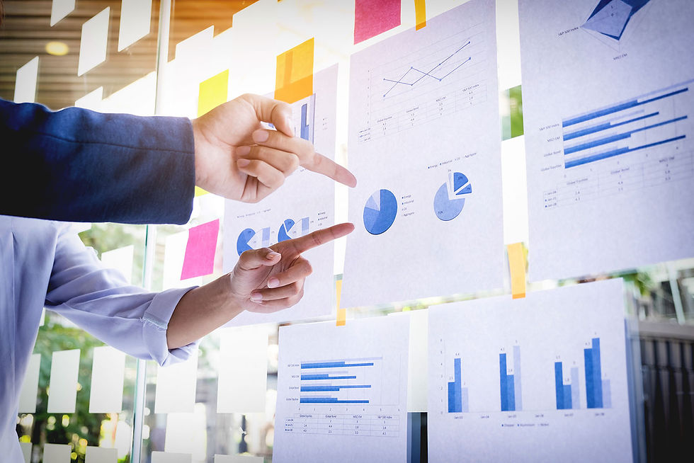 People in a work environment with data and content and work in the agile method