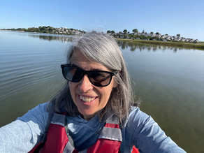 Executive Director, Julia Blatt paddling on the Ipswich River