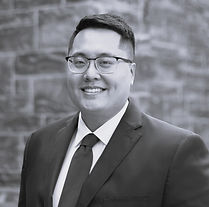 TZ_headshot-bw-1-scaled.jpg