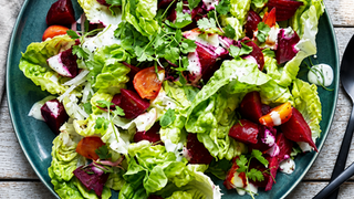 A plate of lettuce beetroot salad