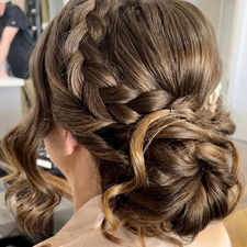 Rear view of romantic braided updo hairstyle by JPC Perth