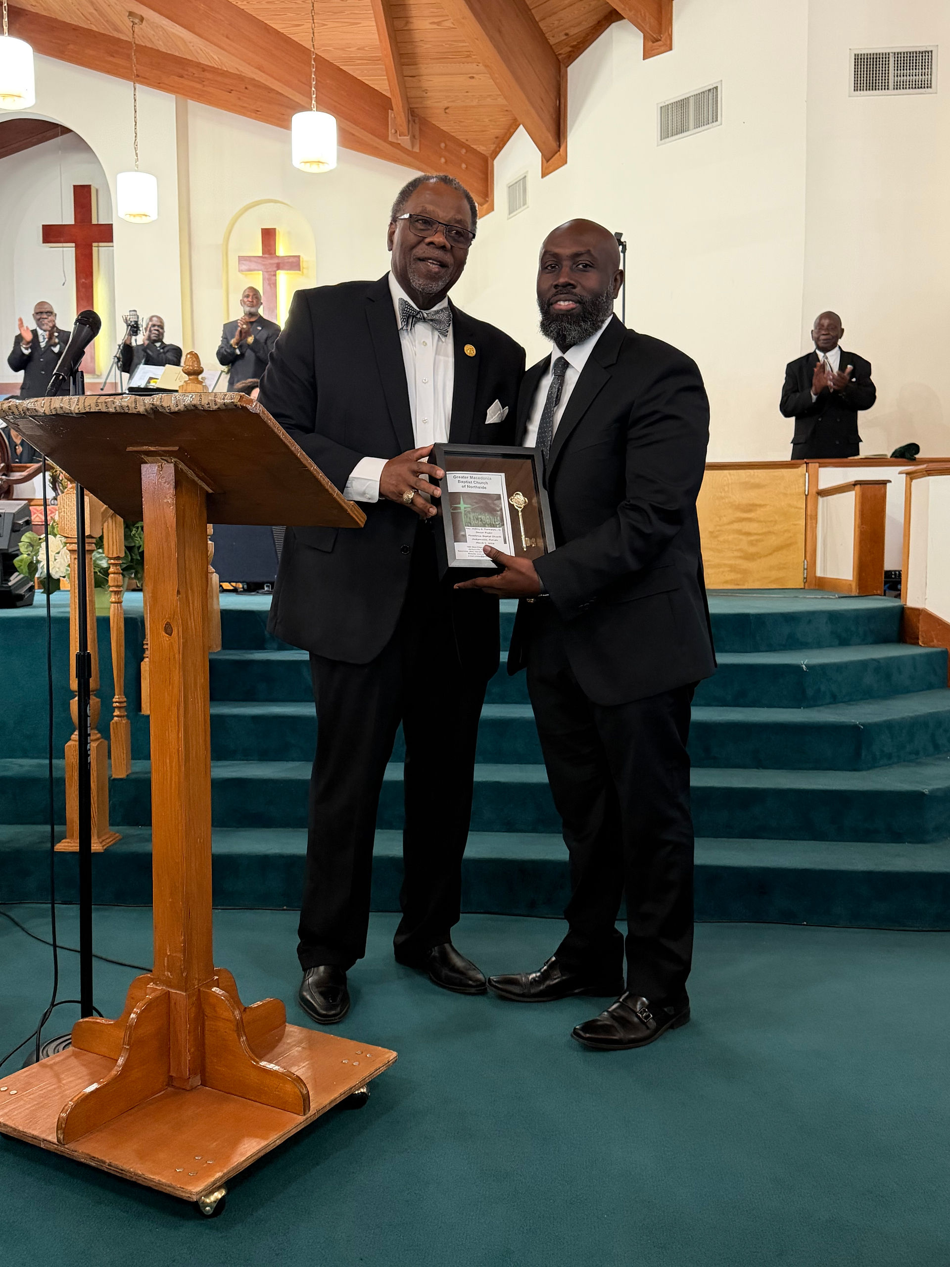 Executive Board Chair Deacon Mathis presentation of Key to the Church to Pastor Thompson
