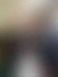 Pastor Thompson greeting shaking hands with W. Turner in church lobby