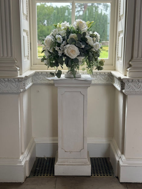 Traditional pedestal, plinth, wedding decor, castle wedding, manor, white roses, eucalyptus arrangement, wedding flowers