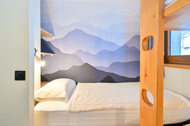 Rénovation appartement Méribel chambre montagne bois clair moderne location saisonnière