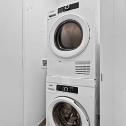 Luxury 2-bed, 2-bath, 2-balcony condo with lakeside views and elevated amenities including a gym, pet spa, party room, and rooftop terrace FOR SALE by The Kesh Group Niagara REALTOR Jordan Saksena.