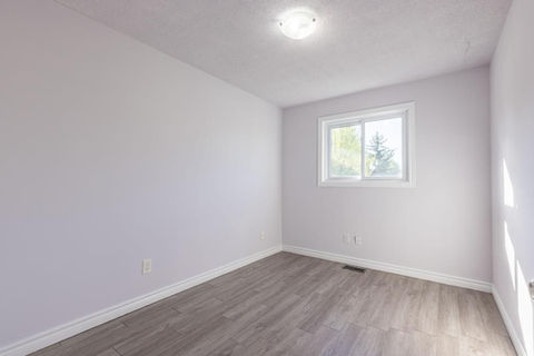 Spacious raised bungalow with 3+3 bedrooms and in-law suite capability in North Welland FOR SALE by The Kesh Group Niagara REALTOR Natalie Keshavarznia.