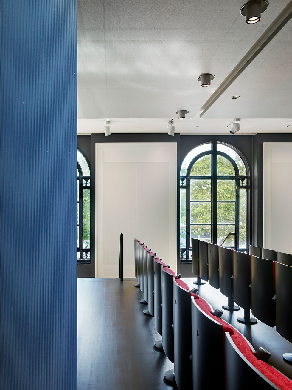 Perelman Auditorium — Stage platform with wooden floor.