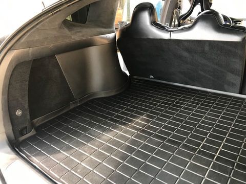 Black all-weather cargo mat in a car trunk