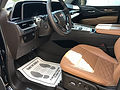 Interior detail service vacuuming carpets and floor mats.