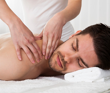 man receiving relaxing Back Massage