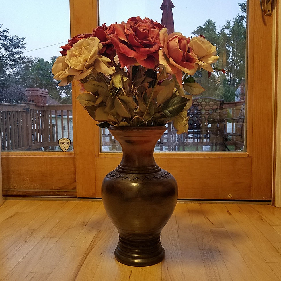 A vase of silk roses