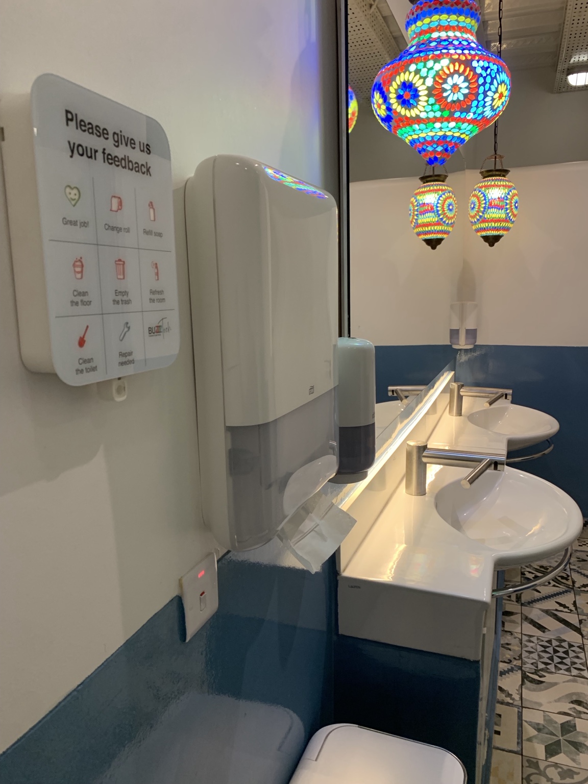 BuzzzTech installed inside a public restroom