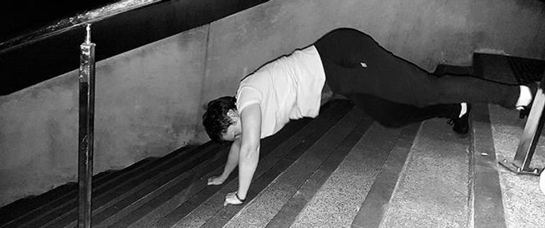 Chloe doing backwards quadripedals up the stairs.