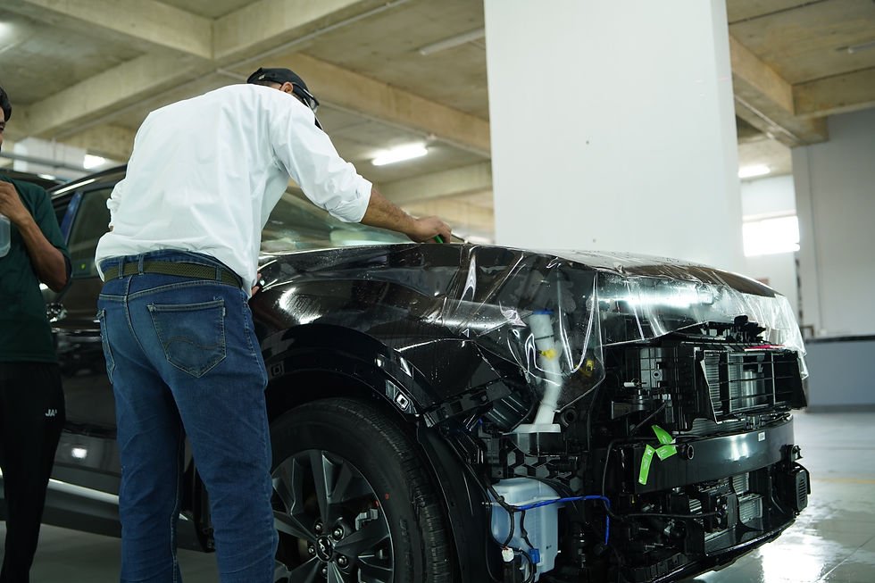 Eye-level view of a car with newly installed paint protection film