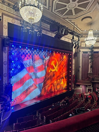 Chess the Musical Imperial Theatre stage shows an American and a Russian flag