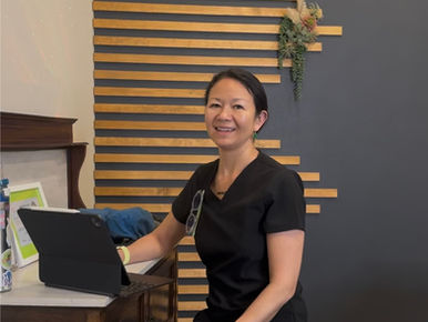 photo of me sitting at my desk for your Las Vegas Massage intake session