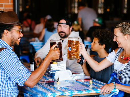 People cheersing with beer for oktoberfest