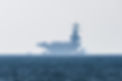 USS George H.W. Bush (CVN-77) usa navy nuclear aircraft carrier resupplying anchored in th
