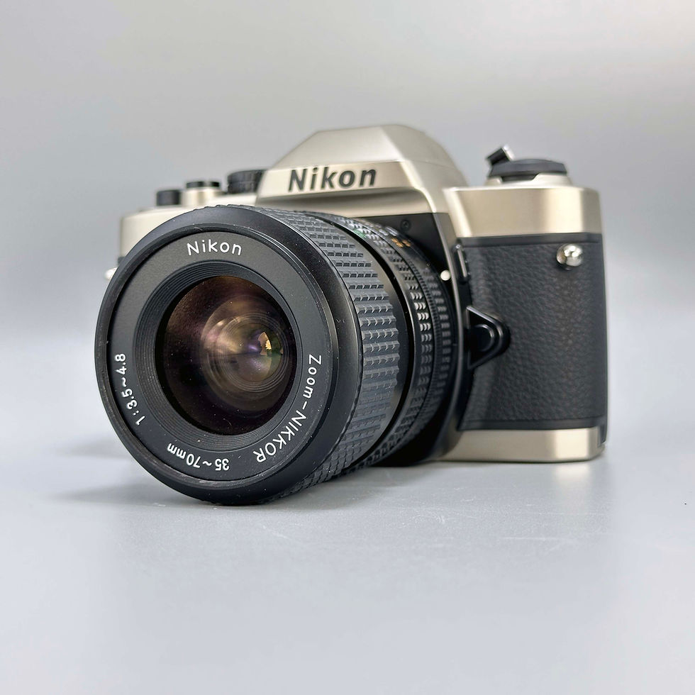 Thumbnail: Nikon FM10 35mm SLR Camera with 35-70mm Lens