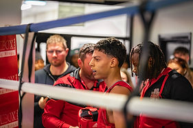 picture of a boxer about to enter a boxing ring for his amateur fight