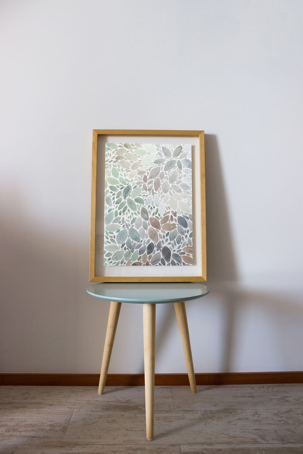 Thumbnail: Abstract watercolor painting of overlapping leaf-shaped forms in muted greens, soft blues, greys, and earthy browns arranged