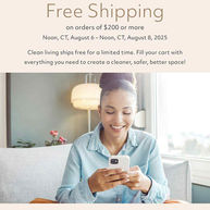 Happy woman ordering Norwex Canada products on phone with free shipping promo August 2025