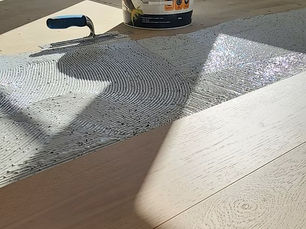 Engineered timber creaking after direct glue installation? Understand seasonal movement, particleboard subfloor behaviour and what’s acceptable.