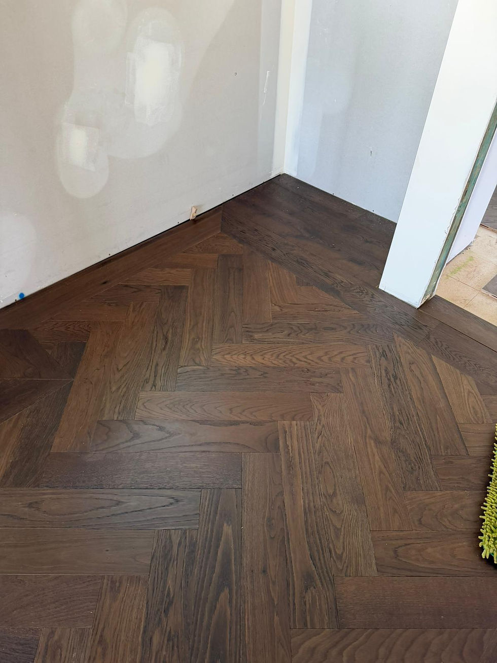 Thumbnail: Dark Brown Herringbone Flooring