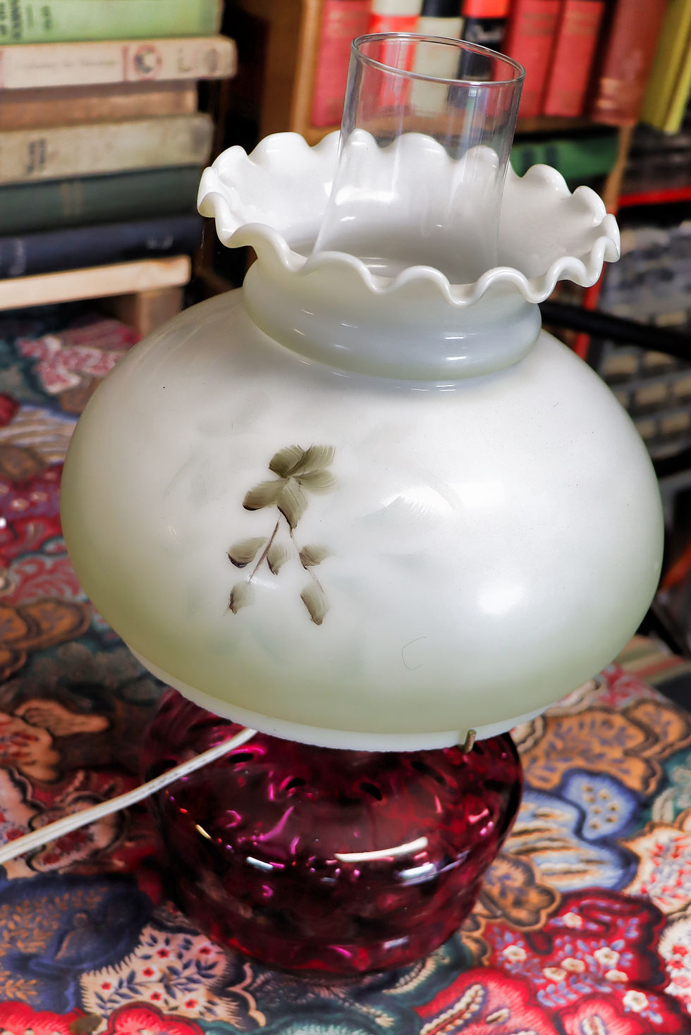 Thumbnail: Vintage cranberry coin spot oil lamp  (electrified) with hand painted shade.