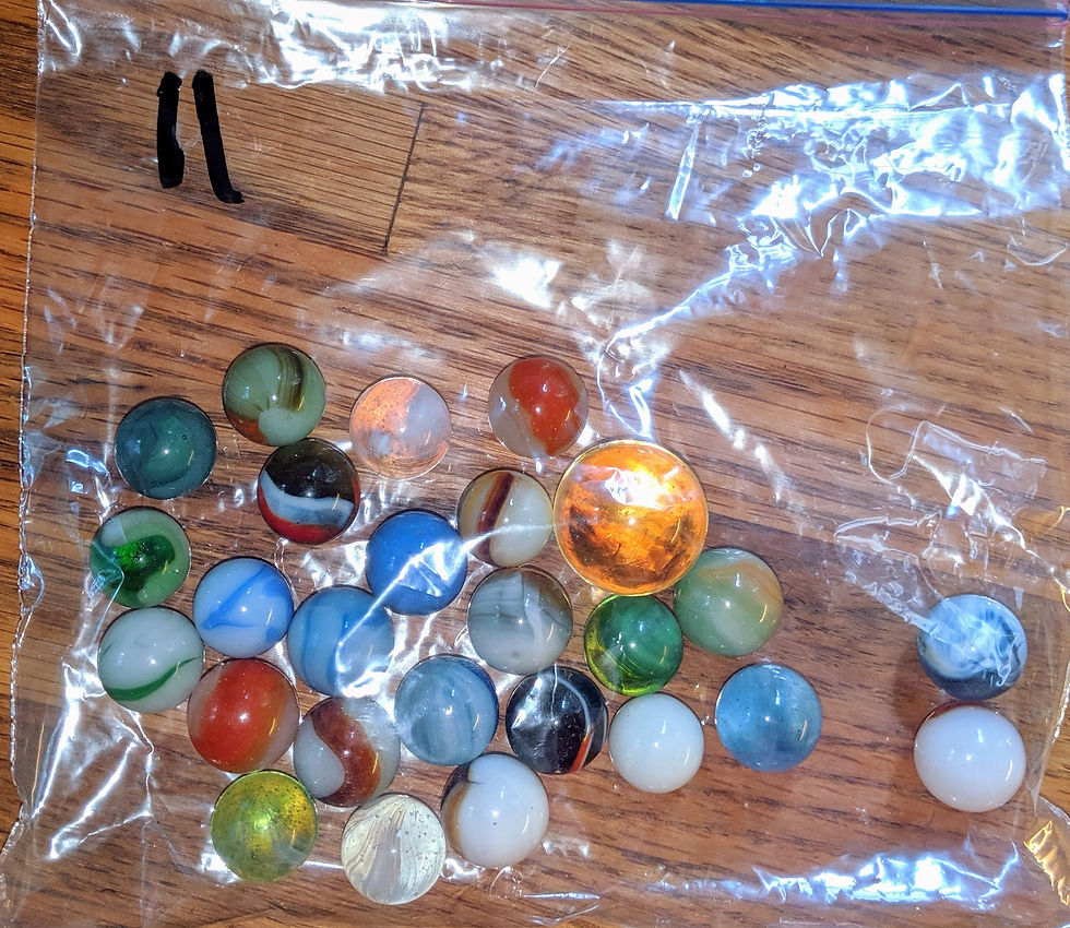 Vintage bag of 25 marbles plus 1 shooter