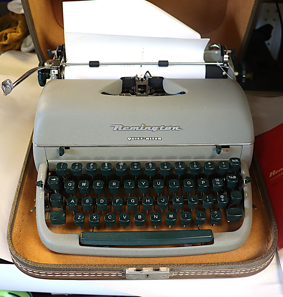 Thumbnail: Vintage Remington Quiet-riter portable manual typewriter with case green key.