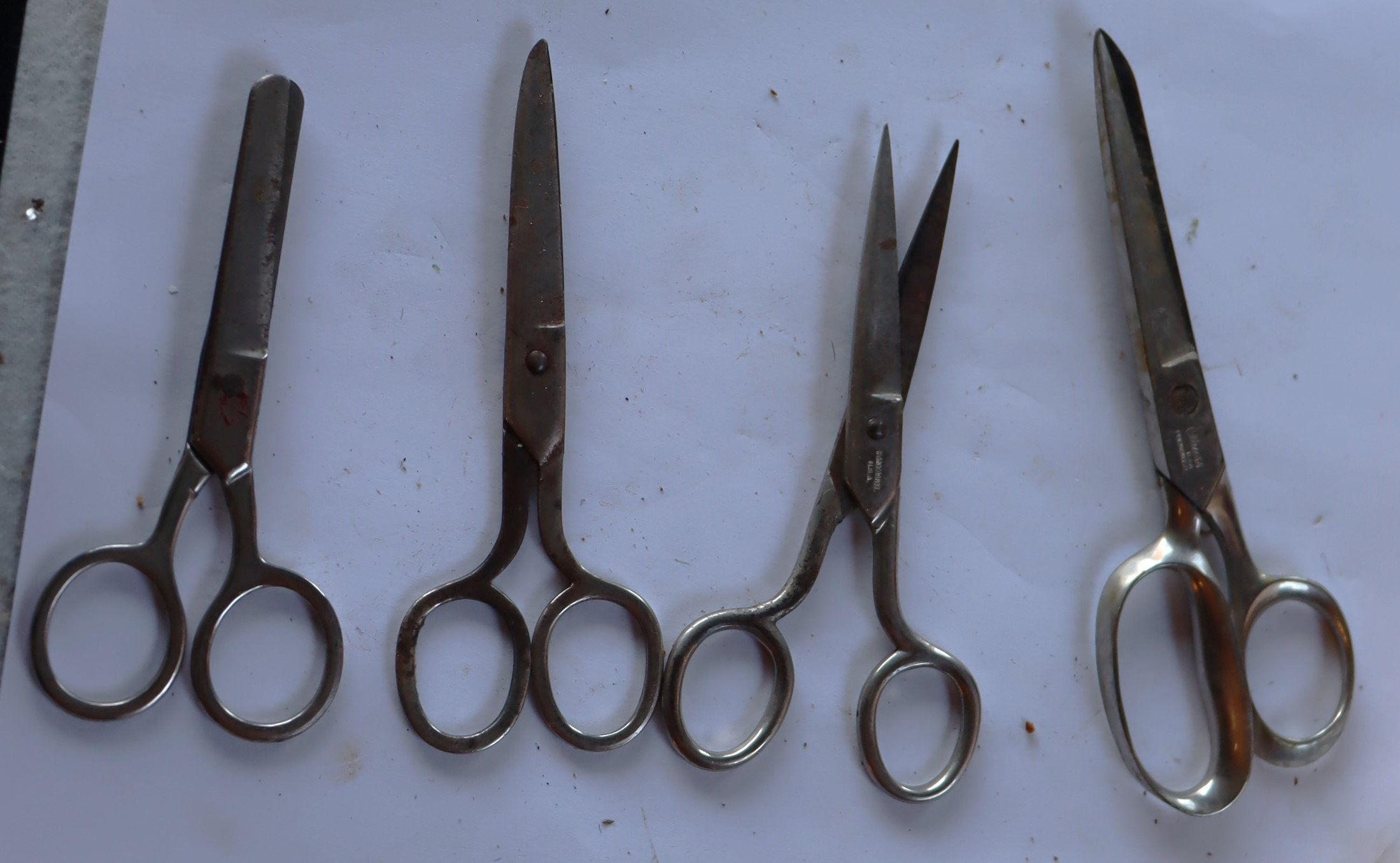 4 vintage pair of  small kids style scissors One is made by Clauss