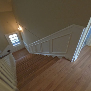 Finished custom-toned Red Oak flooring in Bearspaw, Calgary SW by Advantage Hardwood