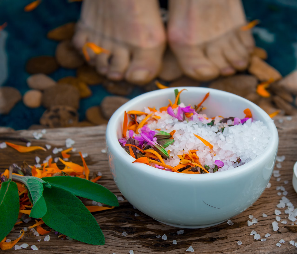 a-bowl-of-sea-salt-with-flowers-in-it